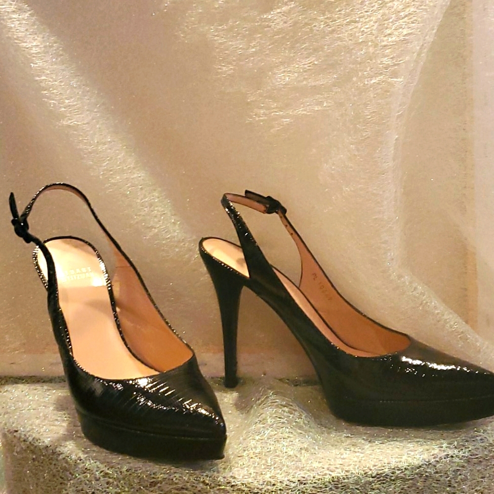 Sharp and flawless snakeskin patent leather heel